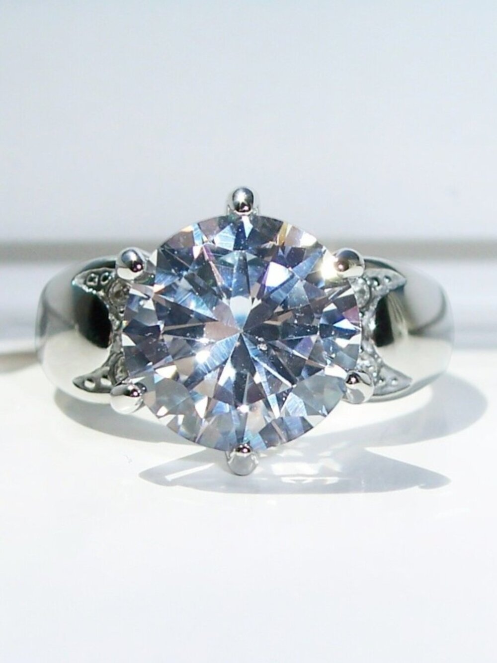 STAINLESS STEEL Solitaire With Accents Cubic Zirconia Ring